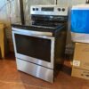WHIRLPOOL Glass Top 4 burners Freestanding Electric Range Model #WFE505W0HZ0