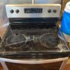 WHIRLPOOL Glass Top 4 burners Freestanding Electric Range Model #WFE505W0HZ0