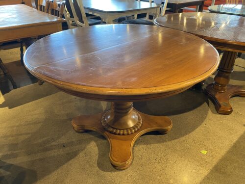 48" Circular Pedestal Table in Medium Wood Tone