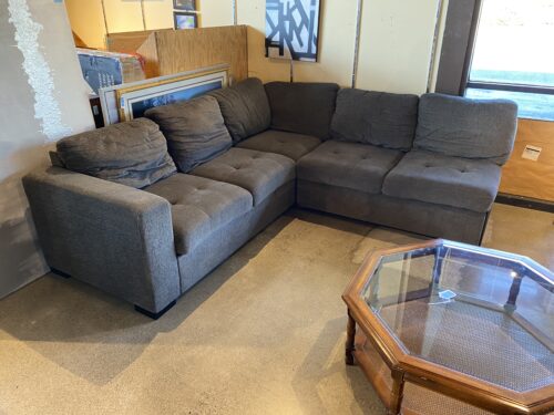 Grey Tufted Sectional with Trundle Sleeper