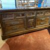 Antique Nine Drawer Dresser with Center Door
