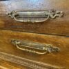 Antique Nine Drawer Dresser with Center Door