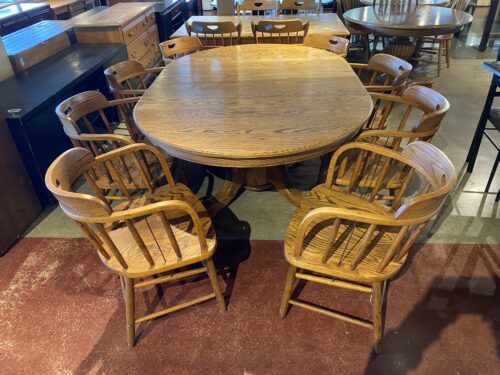 Oval Pedestal Table with Eight Matching Chairs