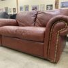 Burgundy Leather Plush Loveseat with Nailhead Trim