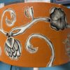 White Geometric Tall Table Lamps w/ Orange Floral Shades (Set of 2)
