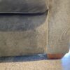 Cozy Olive Green Three Seater Couch with Rolled Arms