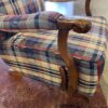 Plaid Rocking Chair with Carved Wood Arms