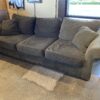 Cozy Olive Green Three Seater Couch with Rolled Arms