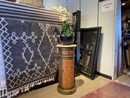 Stone Top Pedestal Cabinet with Orchid Plant