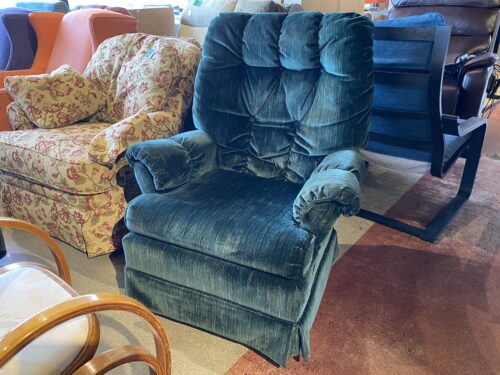 Plush Evergreen Swiveling Armchair