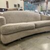 Light Beige Curved Back Sofa with Curled Arms