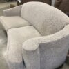 Light Beige Curved Back Sofa with Curled Arms