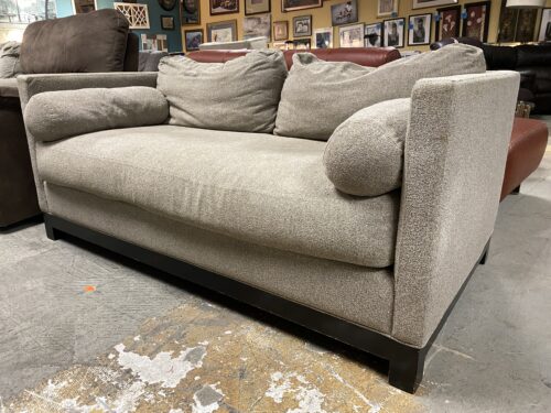 CISCO BROTHERS Beige Upholstered Loveseat w/ Black Wood Base