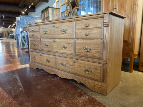 Oak Dresser with Eight Drawers and Ornate Brass Hardware