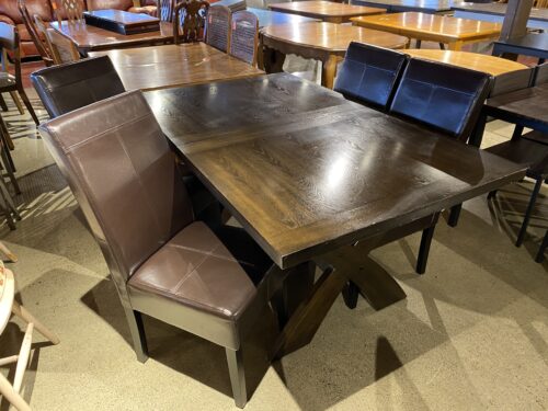 BAYSIDE FURNISHINGS Trestle Style Dining Table with Four Choclate Brown Chairs