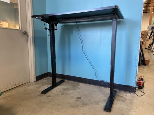 Black Electric Standing Desk with Mounted Power Cable