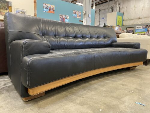 Black Leather Contrast Stitch Curved Base Tufted Sofa