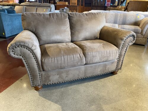 67" Tan Loveseat with Nailhead Detail and Rolled Arms