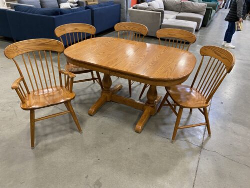 Honey Finished Obround Athol Dining Table with Trestle Base and 5 Spindle Back Chairs