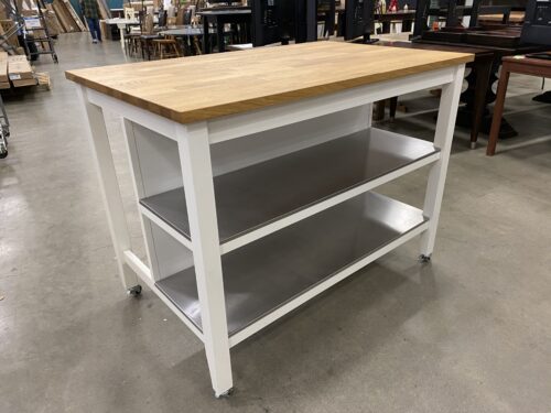 Large Kitchen Island with Metal Shelving and Counter Seating Space