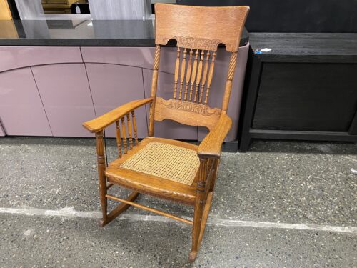 Carved Cane Seat Rocking Chair