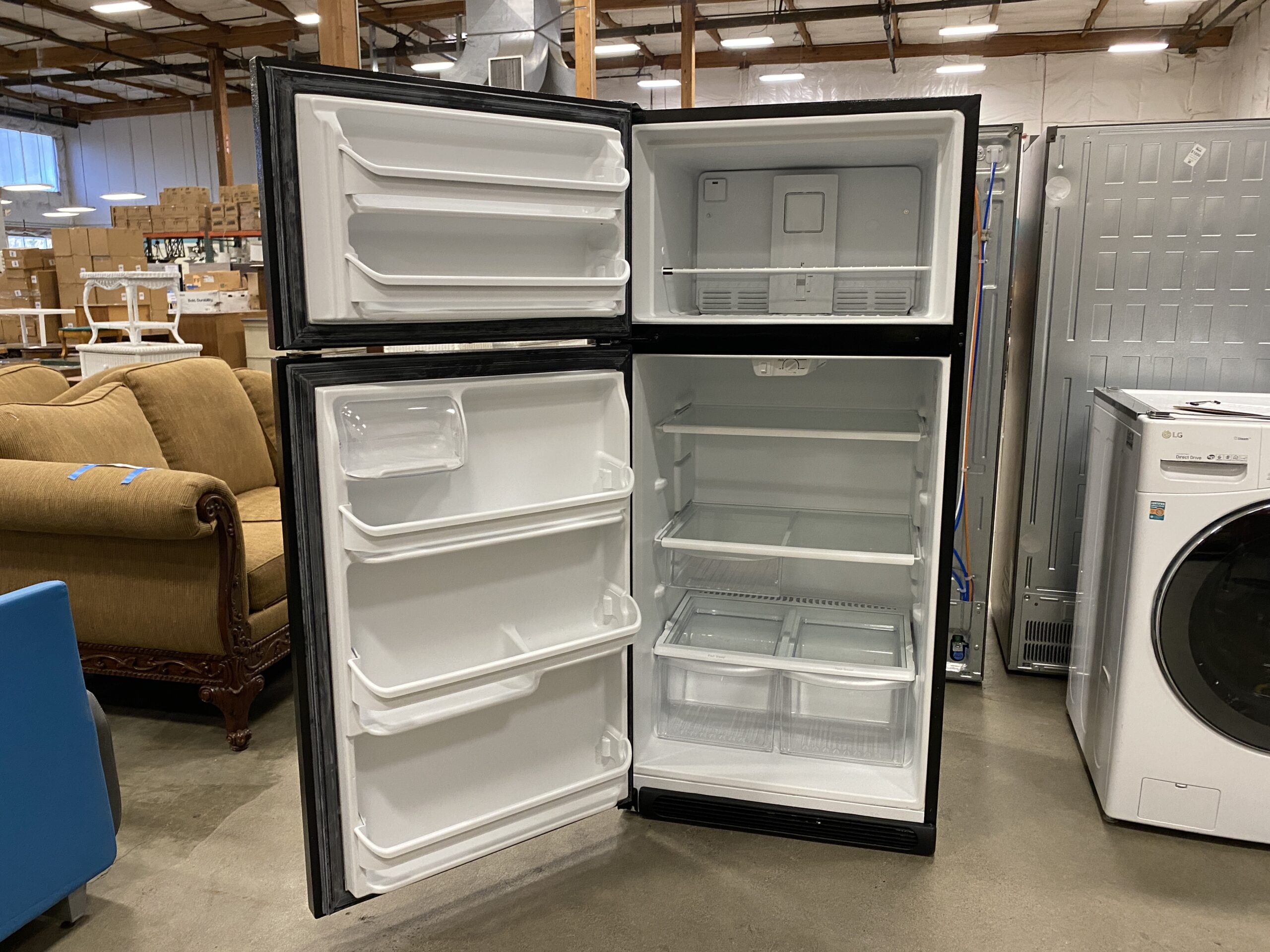 FRIGIDAIRE Black Top Freezer Refrigerator Model #FFTR1821TB0
