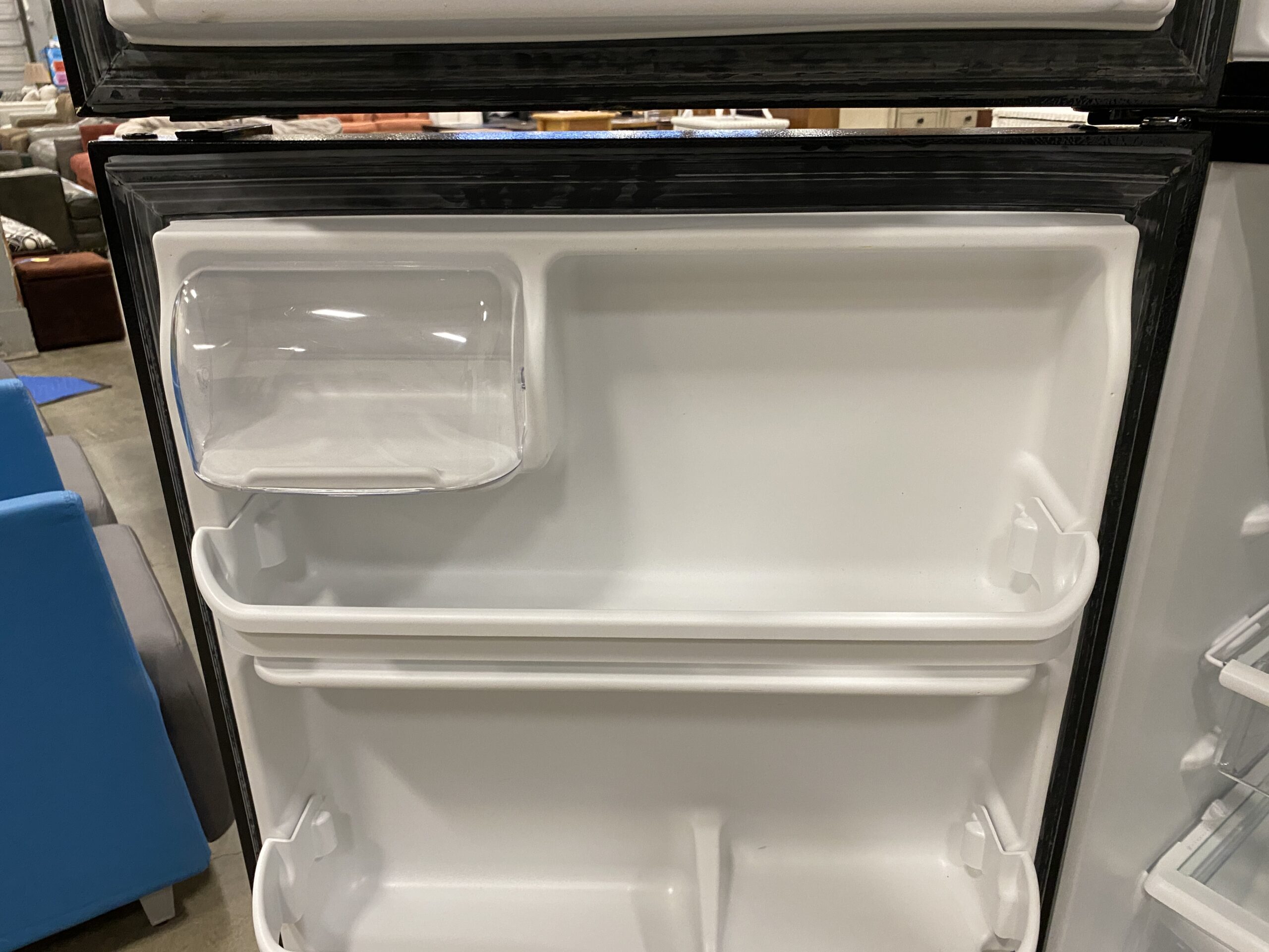 FRIGIDAIRE Black Top Freezer Refrigerator Model #FFTR1821TB0