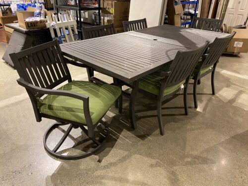 Seven Piece Slate Grey Outdoor Dining Table with Green Cushions