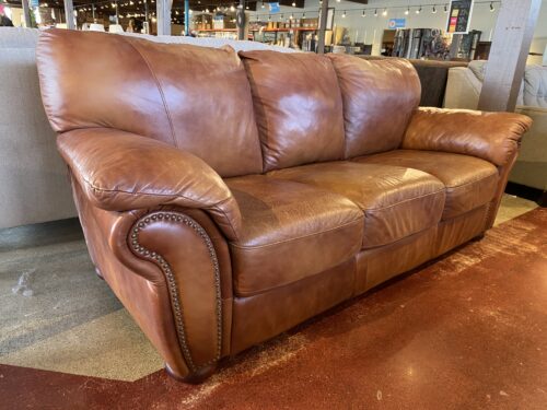 Brown 3-Chusion Sofa With Rolled Arms and Nailhead Trim