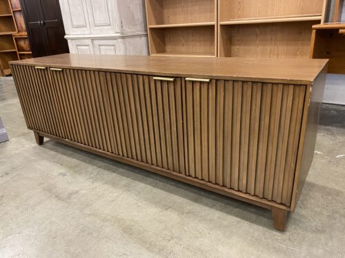 BAYSIDE FURNISHINGS Collins Contemporary Media Console with Vertical Louvred-Style Doors and Sleek Gold Tone Pulls