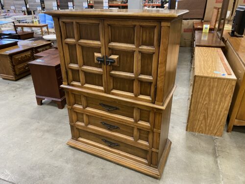 Wooden 6 Drawer Armoire with Blackened Metal Pulls