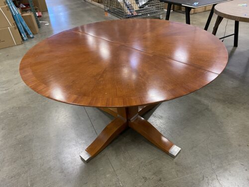 Round Warm Finished Solid Wood Dining Table with Pedestal Base and Silver Accents