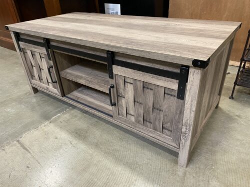 Farmhouse Style Greywashed Media Console with Black Accents and Sliding Barn Doors