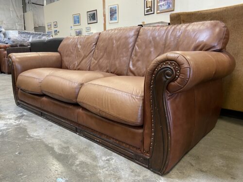 Vintage Distressed Brown Leather 3 Seat Sofa with Carved Wood Base and Nailhead Details