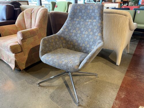 High-Back Swivel Lounge Chair with Circular Pattern Upholstery