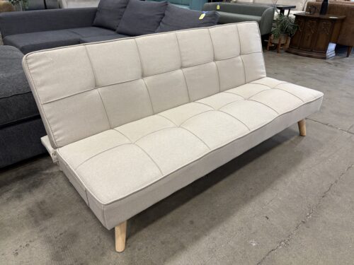 Beige Tufted Futon with Light Wood Legs