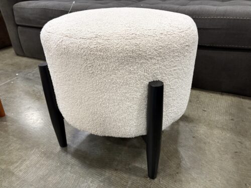 Modern Round Cream Boucle Ottoman with Black Tapered Legs