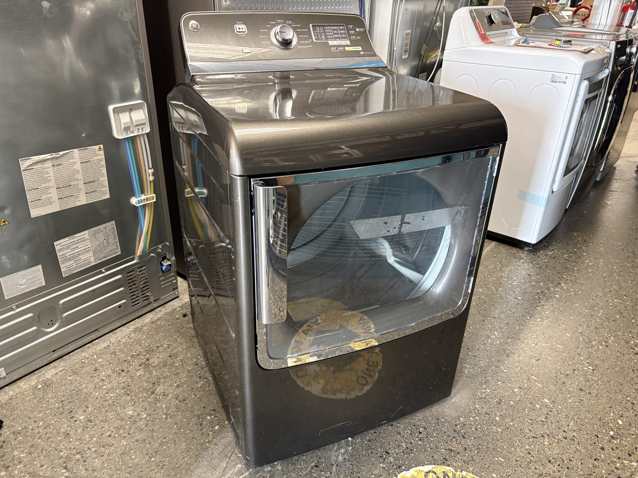 GE 7.8 cu ft Gas Stainless Steel Steam Dryer Model #GTD5825ED0MC