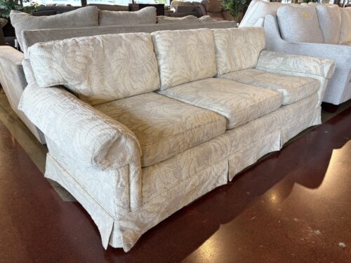 LOEBLEIN CREATIONS Vintage White Skirted Rolled Arm Sofa with Floral Upholstery