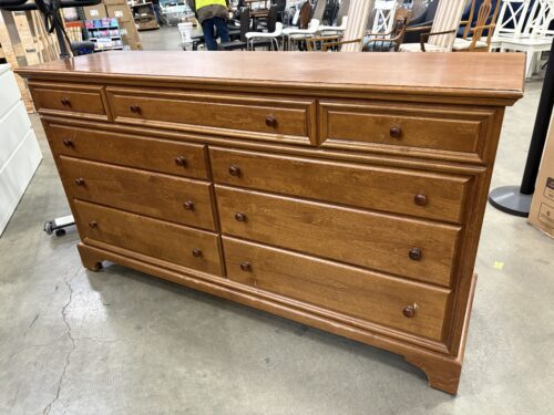 Wooden 9 Drawer Lowboy Dresser with Wooden Pulls