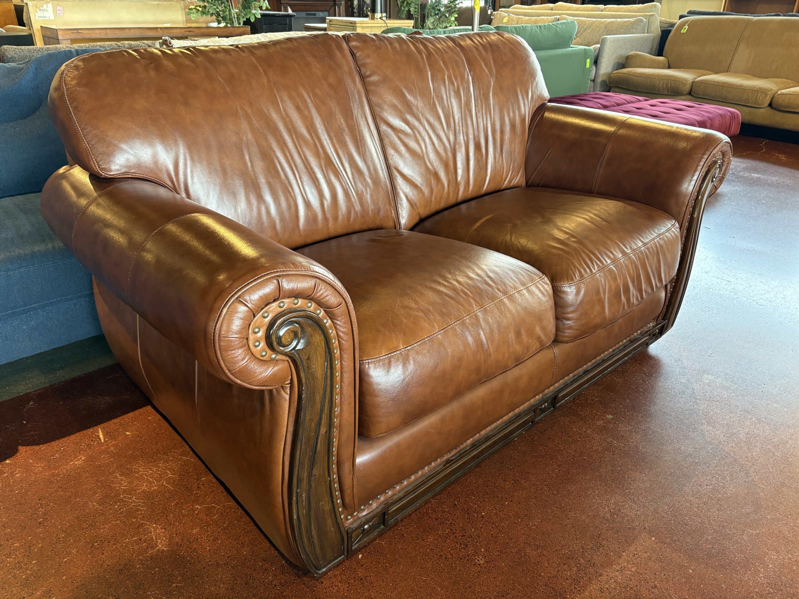 ROBINSON AND ROBINSON  Cognac Top Grain Leather Loveseat