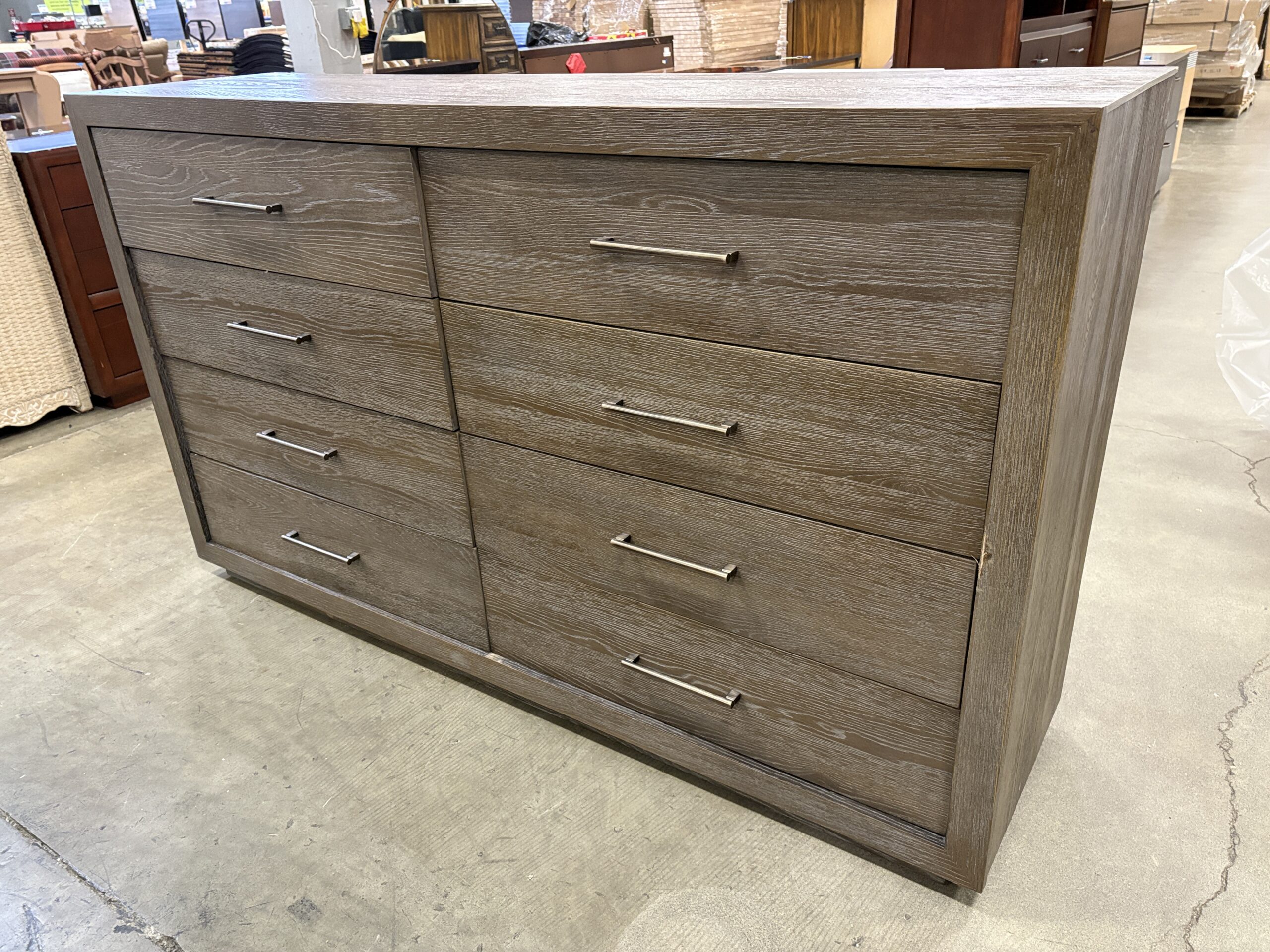 UNIVERSAL Rustic Grey 8 Drawer Dresser with Metal Rail Pulls