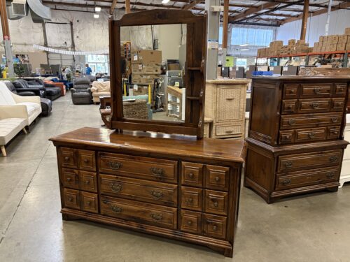 PLYMOUTH PINE Vintage Wooden 9 Drawer Triple Dresser with Mirror and Paneled Drawer Fronts