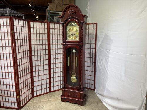 Traditional Grandfather Clock with Decorative Scroll Bonnet Top and a Central Lyre Pendulum
