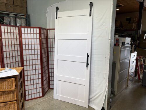 White Sliding Barn Door with Diagonal Panel Design
