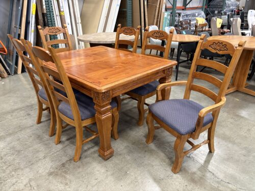 Warm Finished Rustic Farmhouse Dining Set with Carved Floral Details and Extension Leaf