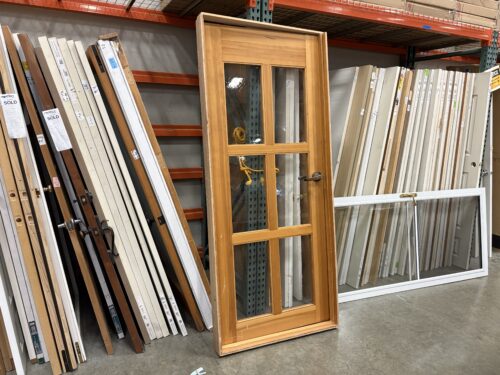 Maple Finished Left Hand Exterior Door with Tempered Wavy Glass Panels