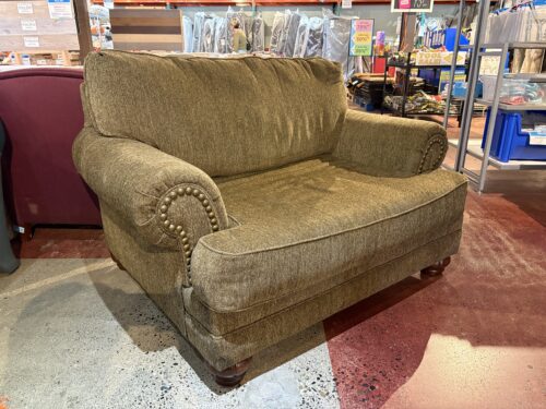 ASHLEY FURNITURE Basil Green Extra Wide Armchair with Nailhead Trim