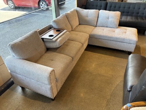 Light Grey L-Shaped Sectional with Nailhead Trim and Fold Down Tray