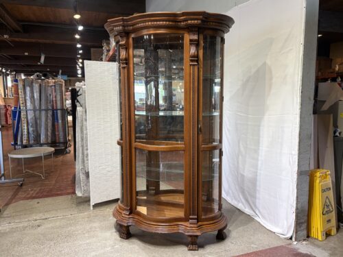 Striking Curved-Front Clawfoot Side-Entry Display Cabinet
